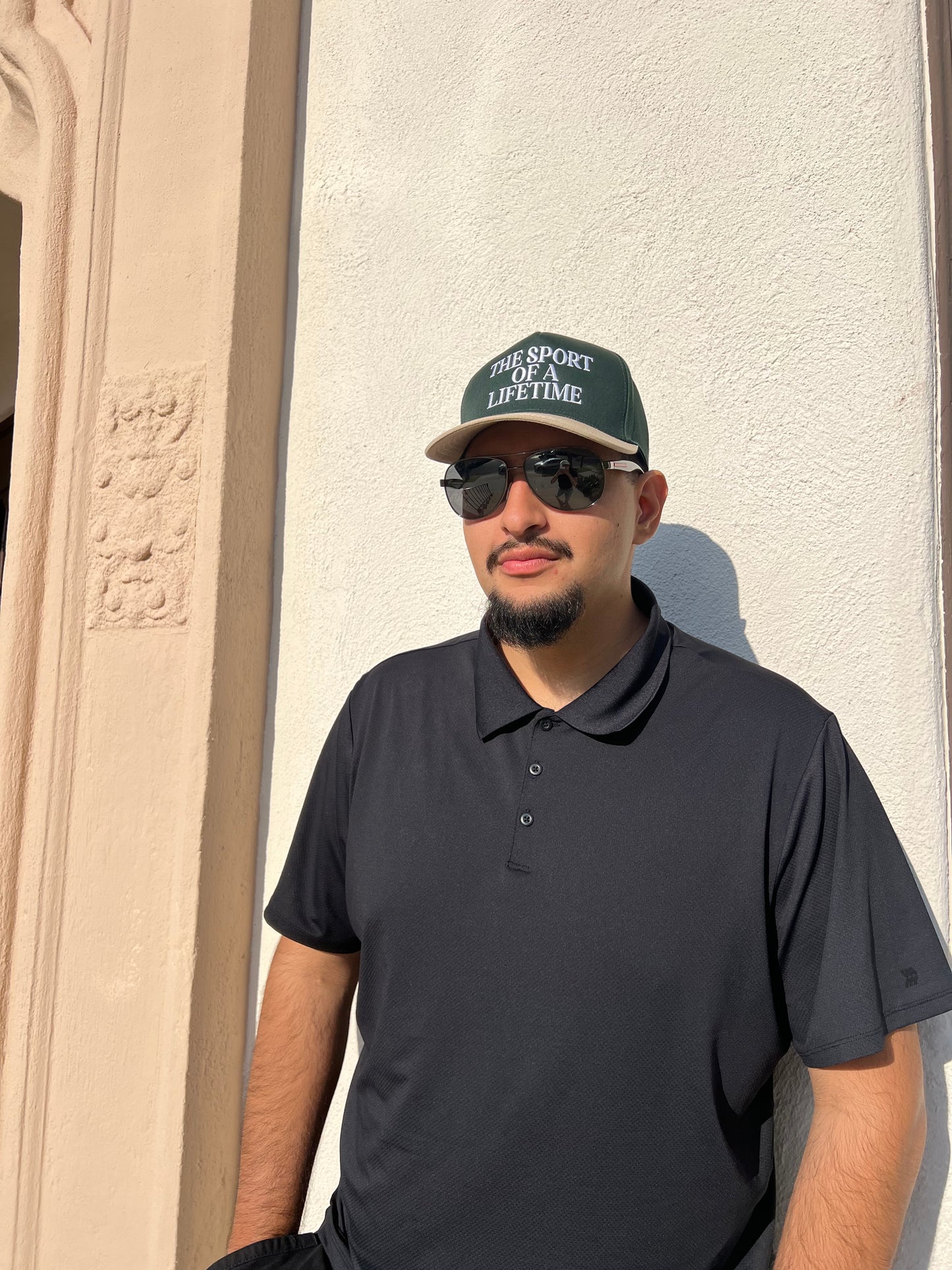 THE SPORT OF A LIFETIME TRUCKER HAT