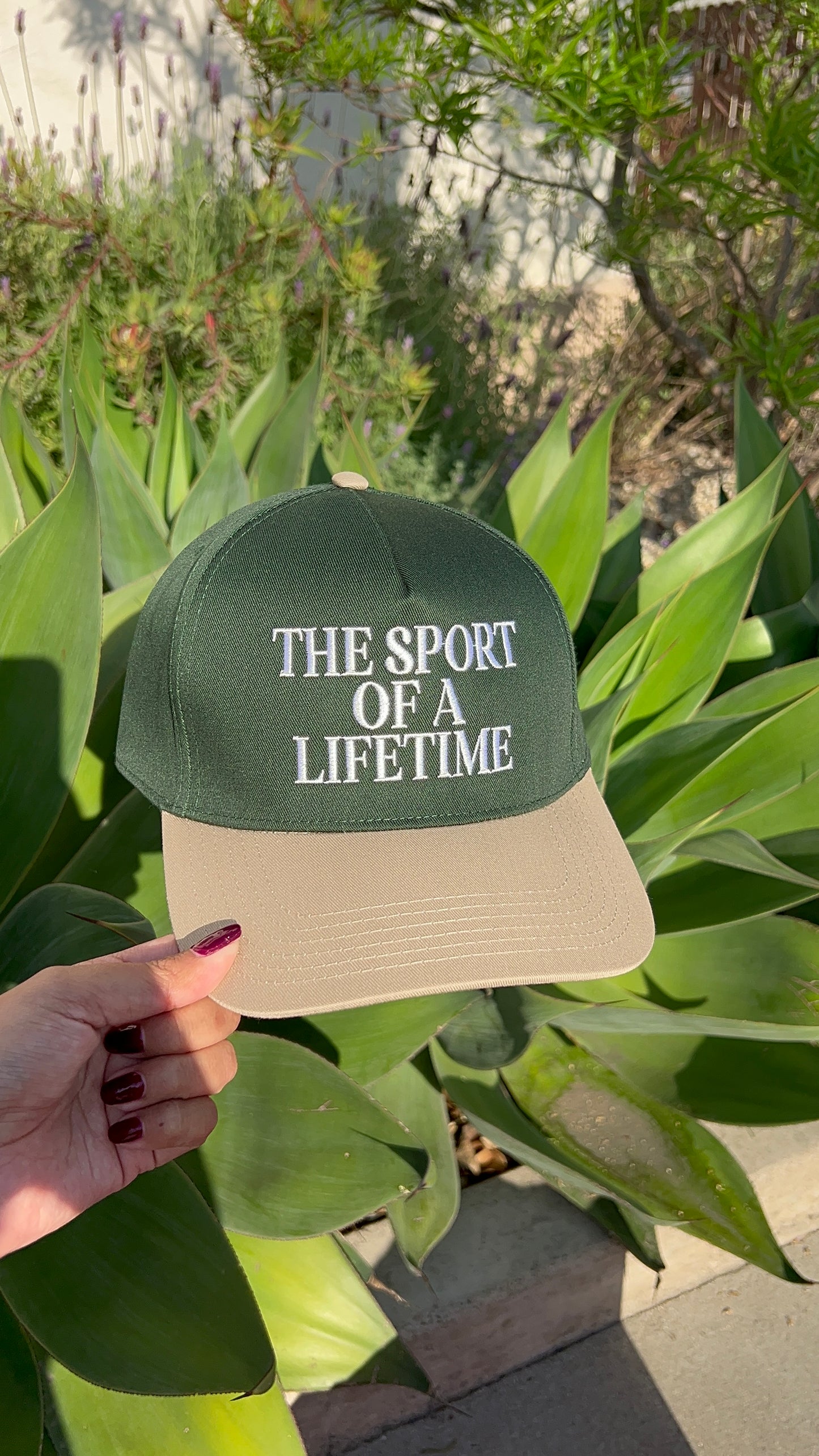 THE SPORT OF A LIFETIME TRUCKER HAT