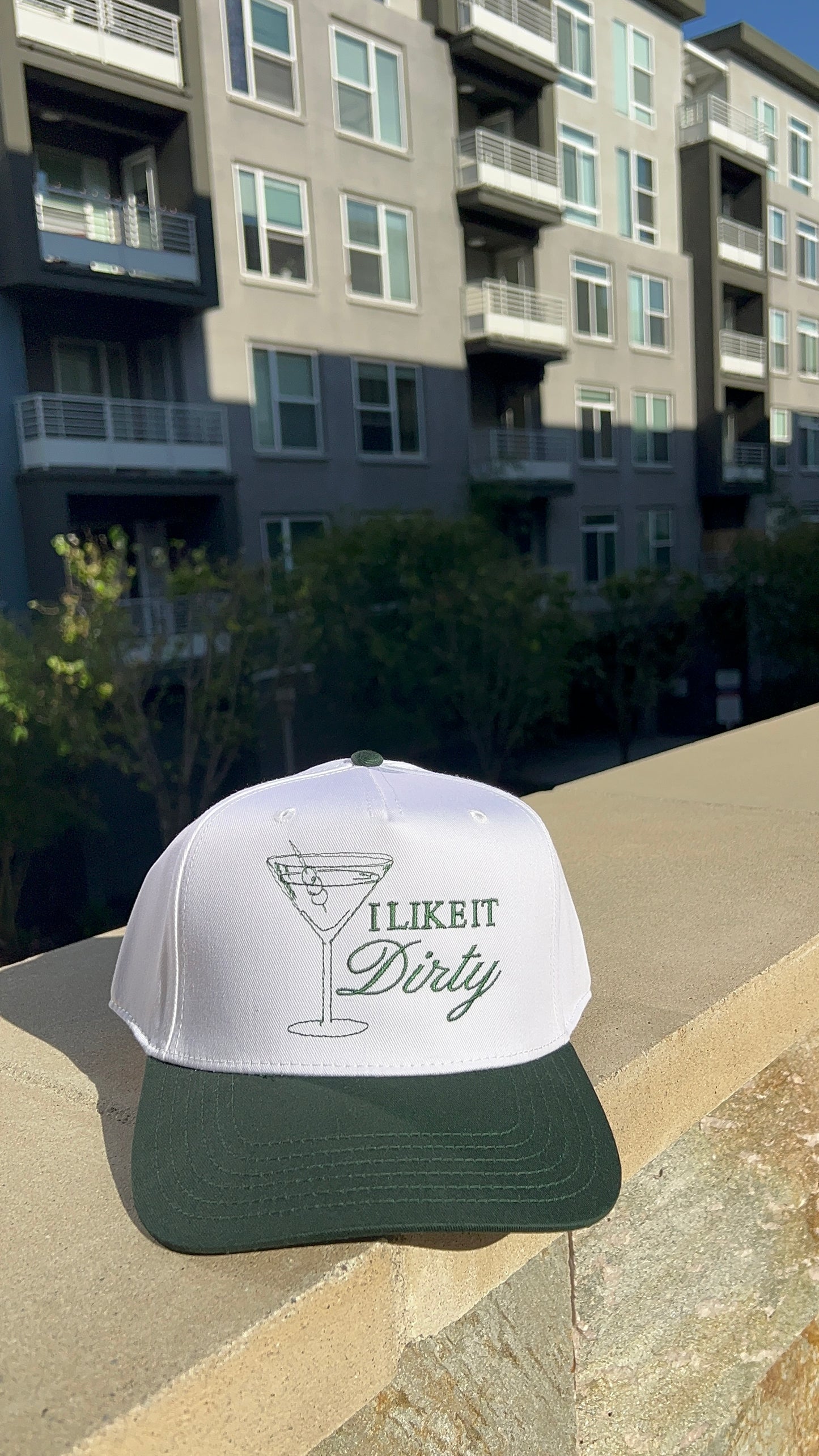 DIRTY MARTINI TRUCKER HAT
